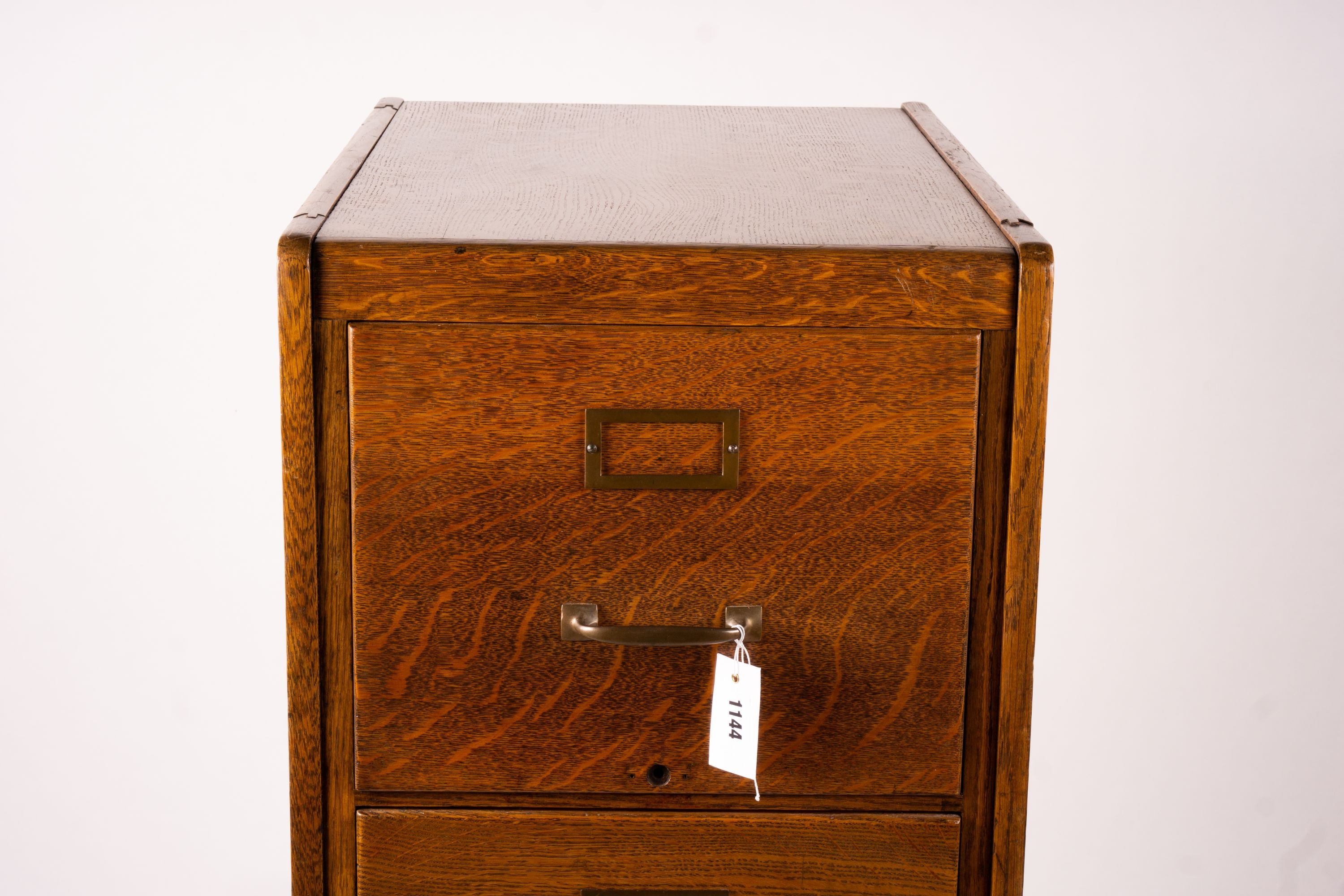 An early 20th century oak four drawer filing cabinet, W.44cm D.70cm. H.132cm